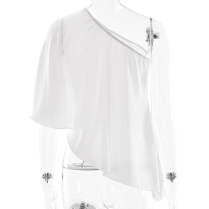 Detail of white one-shoulder top showing asymmetrical cut and draped chiffon fabric