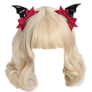 Detail of bat wings and red bows on a long wavy blonde hair wig for Gothic Lolita style