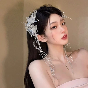Elegante fermaglio per capelli a farfalla con perle nappa e ali lucenti da donna
