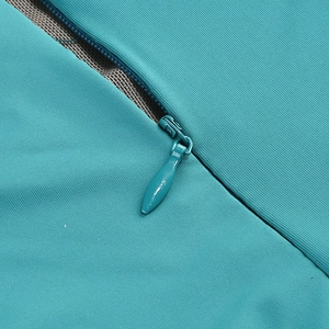 Detail of the high-quality invisible zipper on the lake blue pleated evening dress fabric