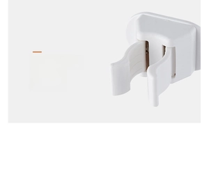 Detail of white wall-mounted mop holder with wave-shaped elastic arms for secure grip