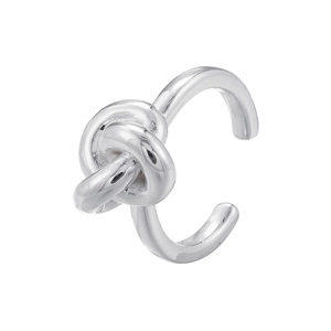 Detailed macro view of a polished silver knot ring with an adjustable open band design