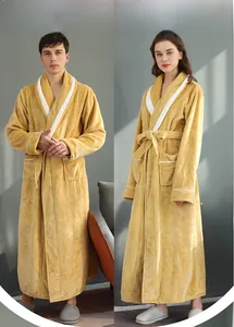 Detail of yellow flannel bathrobe with white piping on the collar and deep pockets