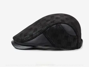 Side view of men's black baseball cap featuring checkered suede and leather patchwork detail