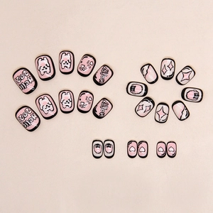 Pink and black press-on nails featuring cute bear, heart, and star hand-painted patterns