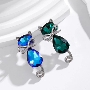 Sparkling crystal cat brooches with blue and green gradients and silver rhinestone details