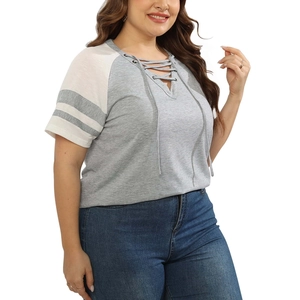 Detail of plus size V-neck T-shirt with contrast raglan sleeves and lace-up neck design
