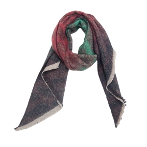 Detail of color-block scarf with grey red and green patterns and fringed edges