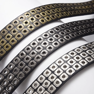 Three punk style PU leather belts with triple-row metal grommets in bronze and silver