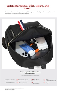 Interior view of black Oxford cloth backpack showing large capacity and multi-compartment storage