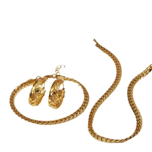 Golden wheat link jewelry set with flat chain necklace and chunky hoop earrings
