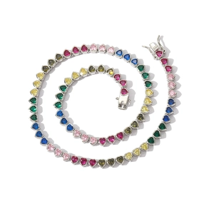 Rainbow heart zircon tennis necklace in colorful gemstone arrangement on white background