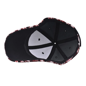 Internal view of a six-panel baseball cap with red, white, and black floral patterns