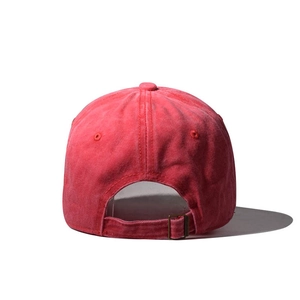 Detailed back view of washed cotton baseball cap with adjustable metal bronze buckle