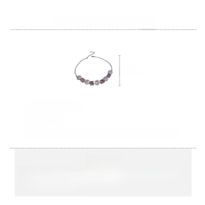 Detail showing the length of the pink zircon flower necklace and high-end copper material