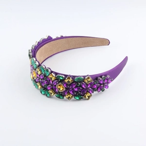 Close-up of baroque wide headband with purple and green crystal floral beadwork detail