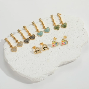 Elegant gold heart earrings set featuring Love charms and assorted colorful gemstones