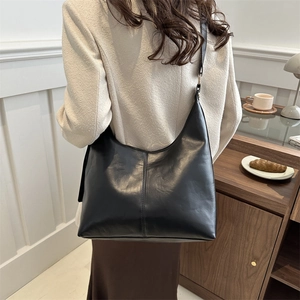 Classic black leather hobo shoulder bag with stylish stitching for women