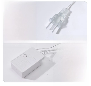 Close-up of 220V power plug and 8-mode light controller for Christmas tree ornaments