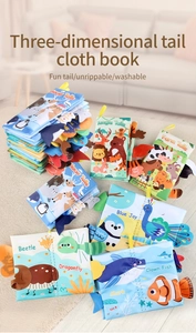 Detail of 3D fabric animal tails on soft washable baby books with sea and forest themes
