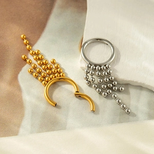 Surgical stainless steel seamless rings with beaded tassels in gold and silver finish
