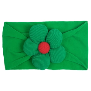 Green nylon elastic headband with a large red center corduroy flower for baby girls