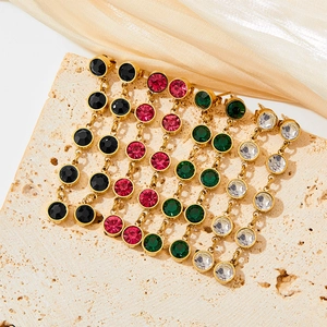 Long gold dangle earrings with colorful zircon tassels in rose red, green and black