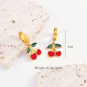 Detailed view of red cherry earrings with gold base showing 3cm size and 6.6g weight