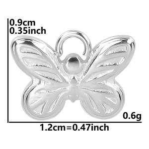 Macro shot of silver butterfly pendant with detailed dimensions 0.9cm height and 1.2cm width