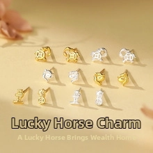 Detailed relief of lucky horse and coin patterns on gold and silver stud earrings