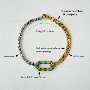 Detail of two-tone stainless steel chain bracelet with green zircon center and measurements