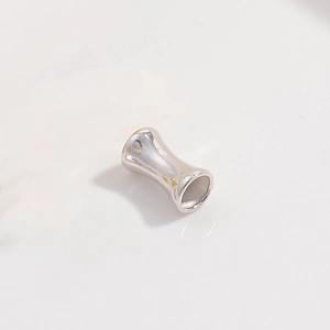 Close-up of S925 sterling silver bamboo joint spacer beads for DIY bracelet making