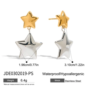 Macro view of stainless steel two-tone star earrings showing 3.10cm height dimension