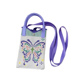 Cute knitted crossbody phone bag with purple handles and butterfly pattern