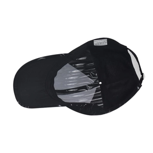 Detail of 100% cotton baseball cap interior with white wash label and shape support