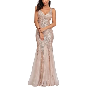 Champagne sequin mermaid evening gown with deep V-neck and sheer tulle hemline