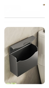 Macro view of gun grey wall-mounted tissue box showing matte metal texture and lid