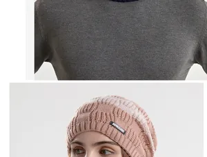 Detail of pink and white striped knit beanie with brand tag and warm fleece lining