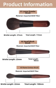 Detail view of 3 makeup brushes with wood handles and soft fiber bristles and sizes