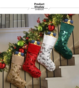 Detailed view of festive glitter stockings with geometric patterns on staircase