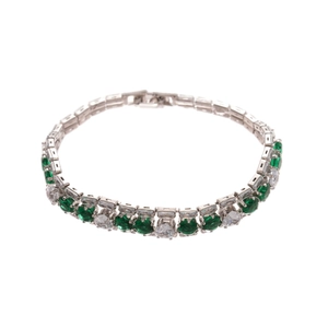 Elegant silver bracelet with double row of green zircon and clear stones in open design