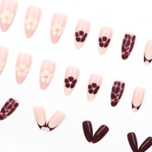 Almond press-on nails with dark brown leopard print and burgundy floral French design