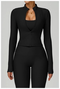 Close-up of slim fit yoga jacket featuring ribbed texture fabric and stand collar detail