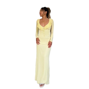 Slim fit light yellow long sleeve dress with V-neck ruffled detail and elastic fabric