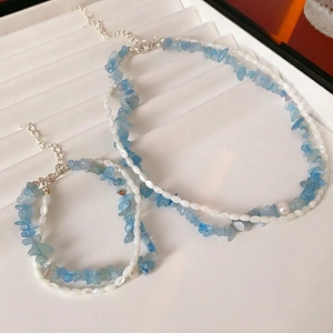 Elegant freshwater pearl and aquamarine gemstone necklace and bracelet set for women