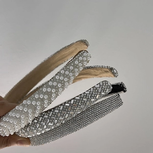Elegant padded headband set featuring white pearls, silver rhinestones, and black rhinestones
