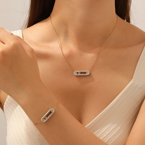 Elegant gold plated stainless steel bracelet and necklace set with sliding diamond pendants