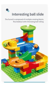 Detail of colorful ball slide blocks with fun emoji balls and spiral tracks for kids