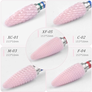 Ceramic nail drill bits set featuring five tapered pink bullet heads in various grits