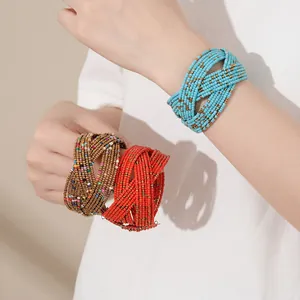 Bracelet manchette bohème multicouche en perles de rocaille aux motifs ethniques tissés